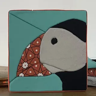 Le tableau fini avec le motif Macareux