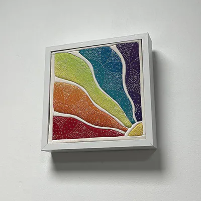 It becomes a textile picture on the wall